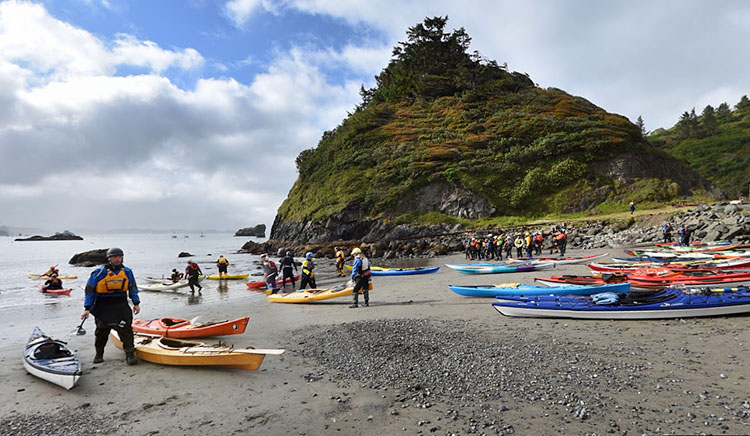 [Photo of kayakers on Launcher Beach]